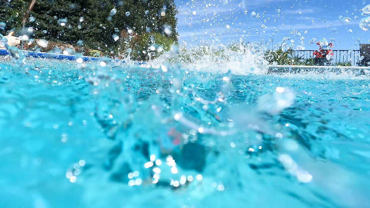 splashing water split shot from Summer 2023 Photoshoot in Ham Lake, MN 