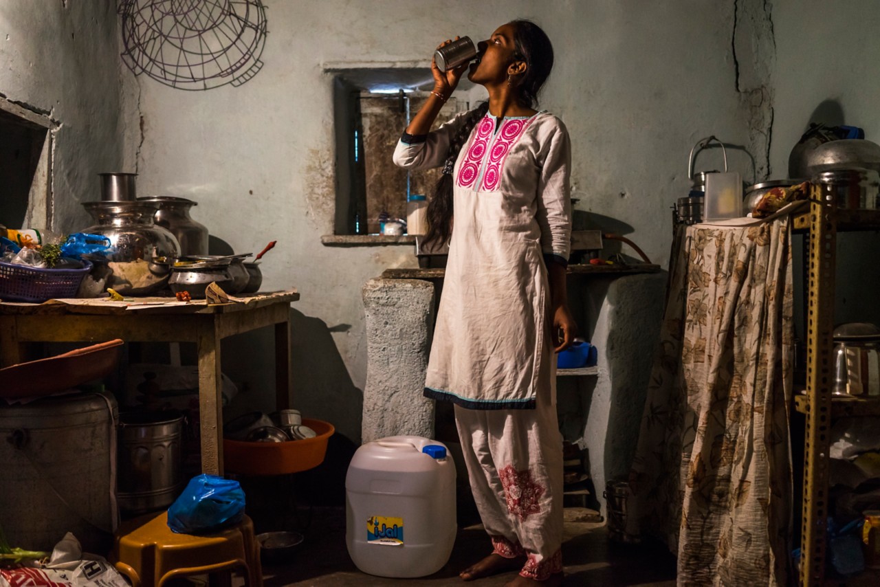 Safe Water Network Woman Drinking Water