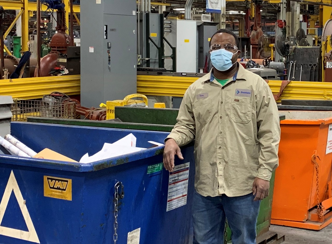 Kansas-City-Tony-standing-next-to-bin-with-mask